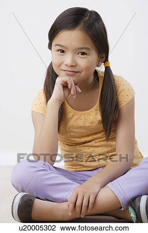 Studio portrait of girl (8-9) View Large Photo Image Stock Image - Studio portrait of girl (8-9). Fotosearch