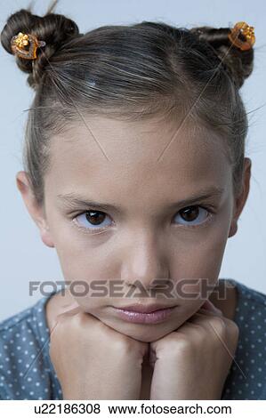 Studio portrait of girl (8-9) View Large Photo Image Stock Photo - Studio portrait of girl (8-9). Fotosearch