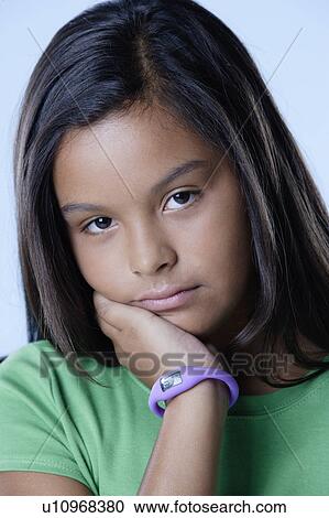 Studio portrait of sad girl (10-11) View Large Photo Image Stock Image - Studio portrait of sad girl (10-11). Fotosearch