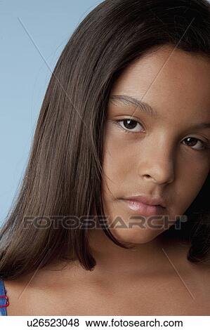 Studio portrait of sad girl (10-11) View Large Photo Image Stock Photo - Studio portrait of sad girl (10-11). Fotosearch