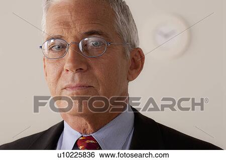 Studio portrait of senior businessman View Large Photo Image Stock Photograph - Studio portrait of senior businessman. Fotosearch