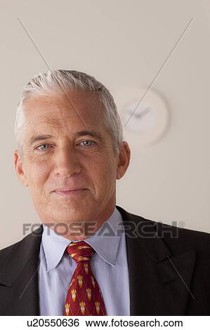 Studio portrait of senior businessman View Large Photo Image Stock Photograph - Studio portrait of senior businessman. Fotosearch