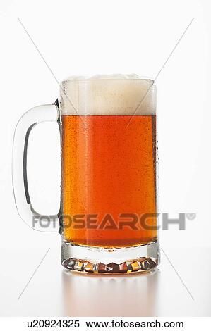 Stock Photography - Studio shot of ale in beer glass. Fotosearch