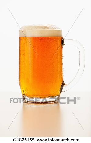 Studio shot of ale in beer glass View Large Photo Image Stock Photography - Studio shot of ale in beer glass. Fotosearch
