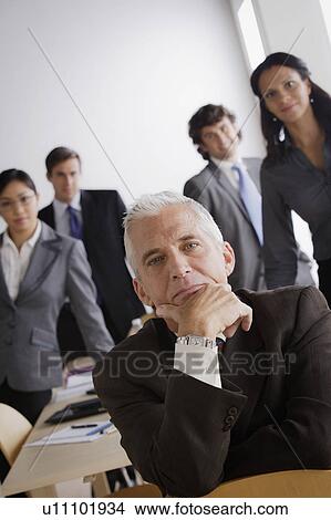 Picture - Studio shot of business people. Fotosearch