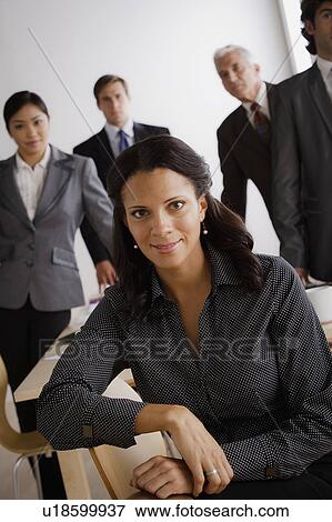 Studio shot of business people View Large Photo Image Stock Photo - Studio shot of business people. Fotosearch