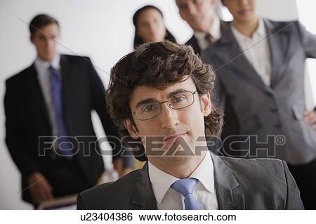 Stock Photograph - Studio shot of business people. Fotosearch