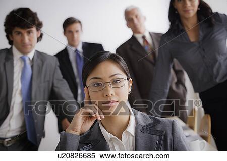 Stock Photography - Studio shot of business people. Fotosearch