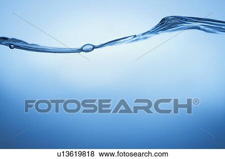 Stock Photo - Studio shot of clear blue water. Fotosearch