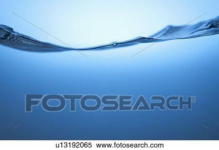 Stock Photography - Studio shot of clear blue water. Fotosearch