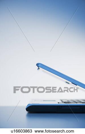 Stock Image - Studio shot of closed laptop. Fotosearch