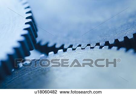 Stock Image - Studio shot of cog wheels. Fotosearch