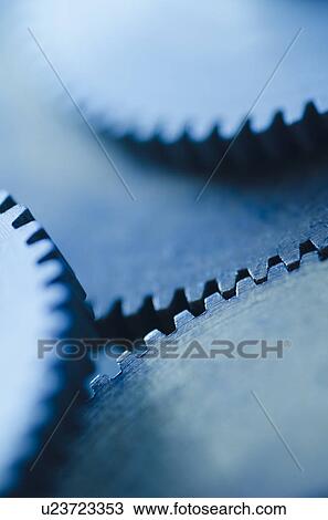 Stock Image - Studio shot of cog wheels. Fotosearch