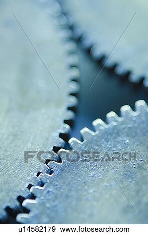 Stock Photo - Studio shot of cog wheels. Fotosearch