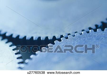 Stock Photo - Studio shot of cog wheels. Fotosearch