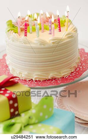 Studio shot of colorful birthday cake and birthday gifts View Large Photo Image Stock Image - Studio shot of colorful birthday cake and birthday gifts. Fotosearch