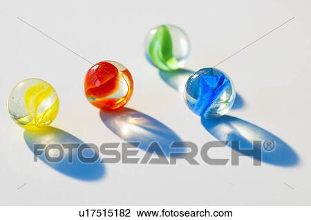 Stock Image - Studio shot of colorful marbles. Fotosearch