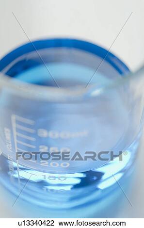 Studio shot of laboratory beaker with blue liquid View Large Photo Image Stock Image - Studio shot of laboratory beaker with blue liquid. Fotosearch