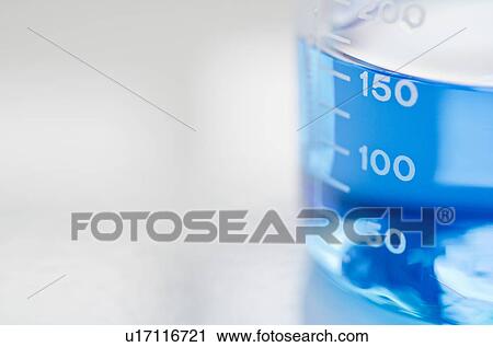 Studio shot of laboratory beaker with blue liquid View Large Photo Image Stock Image - Studio shot of laboratory beaker with blue liquid. Fotosearch