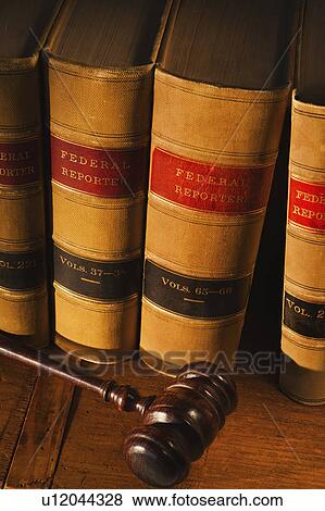 Stock Photo - Studio shot of law books and gavel. Fotosearch