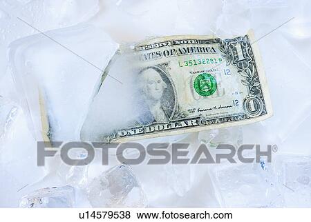 Studio shot of one dollar bill frozen in ice View Large Photo Image Stock Photo - Studio shot of one dollar bill frozen in ice. Fotosearch