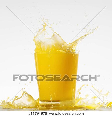 Stock Photography - Studio shot of orange juice with splash. Fotosearch