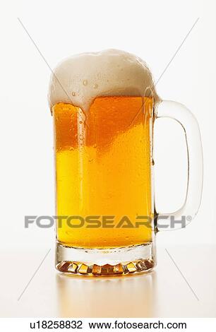 Studio shot of pale ale in beer glass View Large Photo Image Stock Image - Studio shot of pale ale in beer glass. Fotosearch