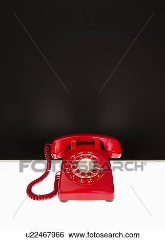 Studio shot of red phone View Large Photo Image Stock Photograph - Studio shot of red phone. Fotosearch