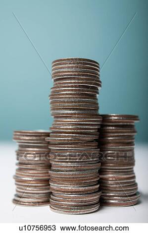 Stock Image - Studio shot of stacks of coins. Fotosearch