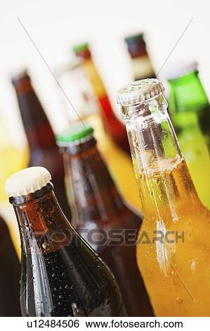 Stock Photograph - Studio shot of various beer bottles. Fotosearch