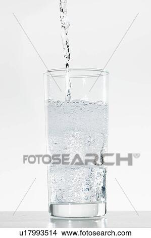 Studio shot of water being poured into glass View Large Photo Image Picture - Studio shot of water being poured into glass. Fotosearch