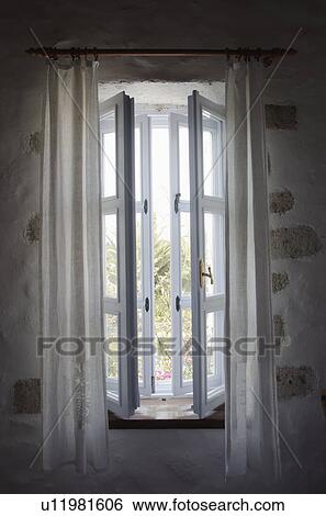 Turkey, Cesme, Alacati, open window in house View Large Photo Image Stock Photograph - Turkey, Cesme, Alacati, open window in house. Fotosearch