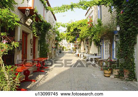 Turkey, Cesme, Alacati, traditional alley in village View Large Photo Image Stock Photography - Turkey, Cesme, Alacati, traditional alley in village. Fotosearch
