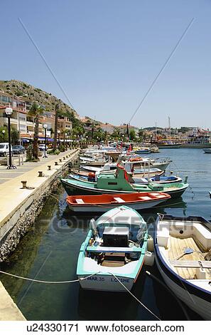 Stock Image - Turkey, Cesme, boats in harbor. Fotosearch