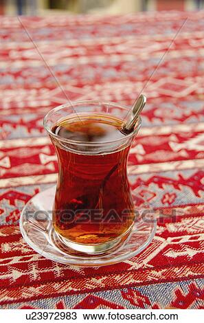 Turkey, Istanbul, glass of tea on table View Large Photo Image Stock Image - Turkey, Istanbul, glass of tea on table. Fotosearch