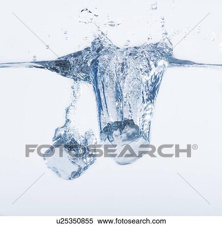 Two ice cubes splashing into water, studio shot View Large Photo Image Stock Photography - Two ice cubes splashing into water, studio shot. Fotosearch