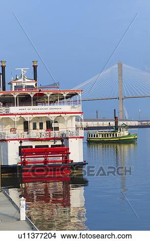 Picture - USA, Georgia, Savannah, Passenger ship with Talmadge Bridge in background. Fotosearch