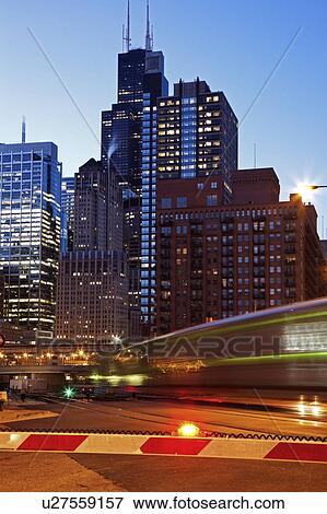 Stock Photo - USA, Illinois, Chicago Skyscrapers at dusk. Fotosearch