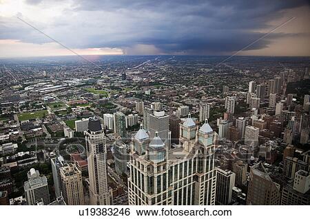 Stock Photograph - USA, Illinois, Chicago, Storm cloud over city. Fotosearch