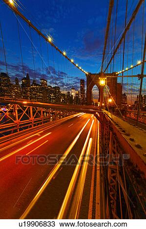 USA, New York City, Brooklyn Bridge with light trails at dusk View Large Photo Image Stock Image - USA, New York City, Brooklyn Bridge with light trails at dusk. Fotosearch