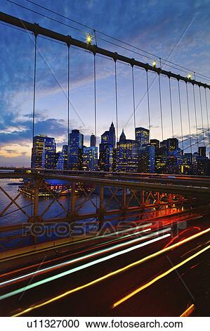 USA, New York State, New York City, Lower Manhattan and Brooklyn Bridge at dusk View Large Photo Image Stock Image - USA, New York State, New York City, Lower Manhattan and Brooklyn Bridge at dusk. Fotosearch