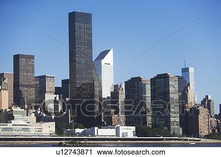 Stock Image - USA, New York State, New York City, Manhattan, Trump Worldwide Plaza. Fotosearch