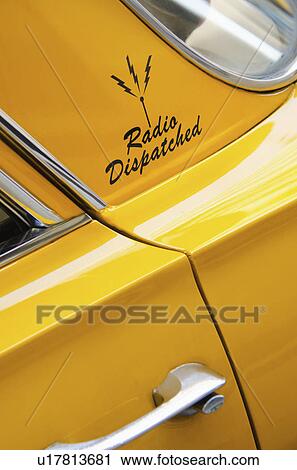Stock Image - USA, New York State, New York City, Close-up of antique taxi. Fotosearch