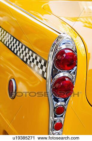 Stock Image - USA, New York State, New York City, Close-up of antique taxi. Fotosearch