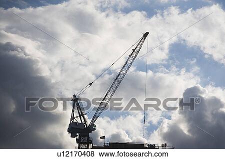 Stock Photo - USA, New York State, New York City, Manhattan, Skyscraper under construction. Fotosearch