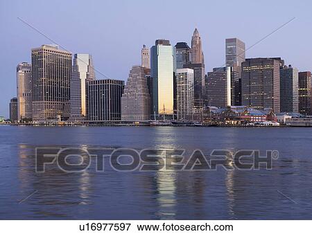 USA, New York State, New York City, Manhattan, Skyscrapers of Manhattan at dusk View Large Photo Image Stock Photo - USA, New York State, New York City, Manhattan, Skyscrapers of Manhattan at dusk. Fotosearch