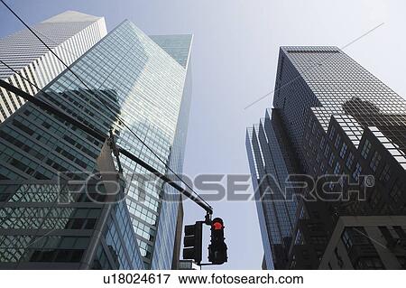 Stock Photo - USA, New York State, New York City, Manhattan, Low angle view of skyscrapers. Fotosearch
