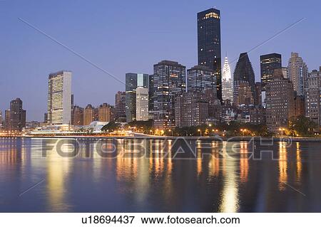 USA, New York State, New York City, Manhattan, Skyscrapers of Manhattan at dusk View Large Photo Image Stock Photo - USA, New York State, New York City, Manhattan, Skyscrapers of Manhattan at dusk. Fotosearch