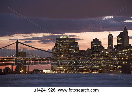 USA, New York State, New York City, Manhattan, Skyscrapers of Manhattan at dusk View Large Photo Image Stock Photograph - USA, New York State, New York City, Manhattan, Skyscrapers of Manhattan at dusk. Fotosearch