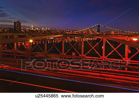 USA, New York State, New York City, Midtown Manhattan and Brooklyn Bridge at dusk View Large Photo Image Stock Photography - USA, New York State, New York City, Midtown Manhattan and Brooklyn Bridge at dusk. Fotosearch